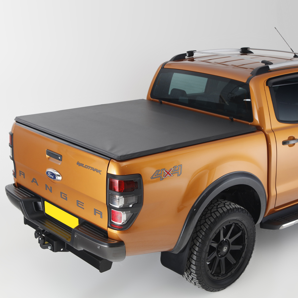 Tonneau cover with hidden press snap