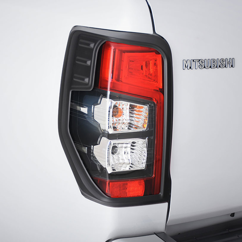 Mitsubishi L200 series 6 black rear light covers