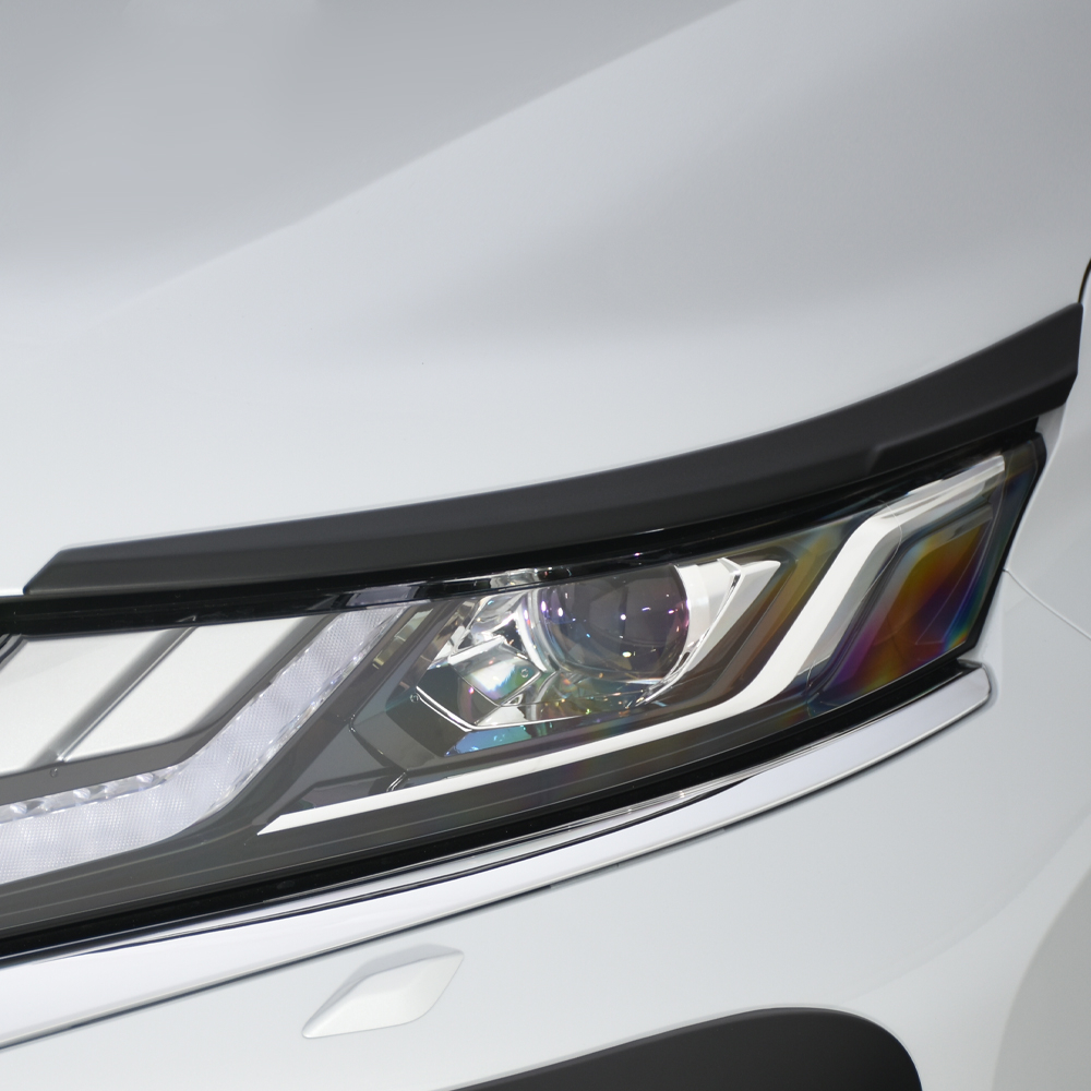 Mitsubishi L200 series 6 headlight surrounds - black