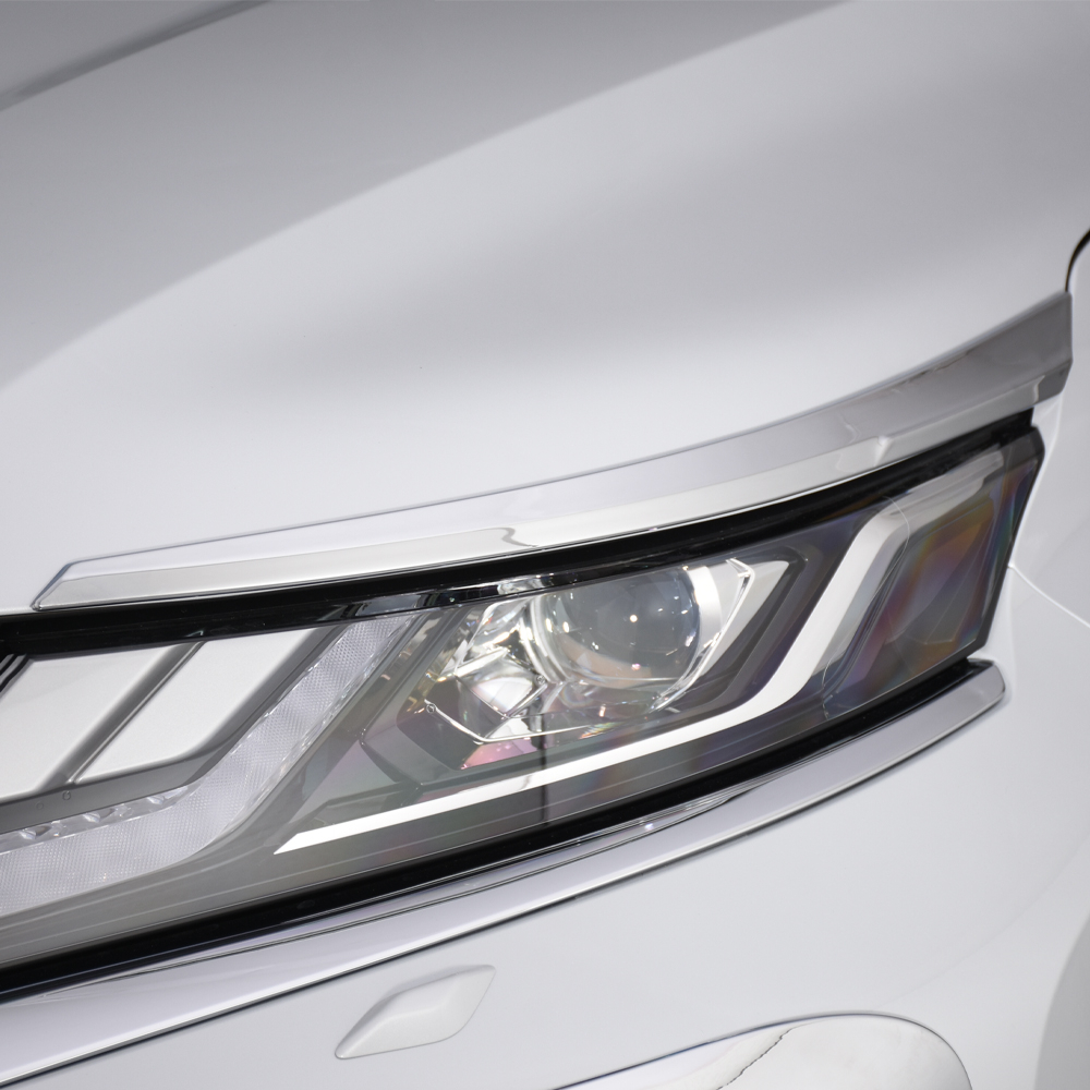 Mitsubishi L200 series 6 headlight surrounds - chrome