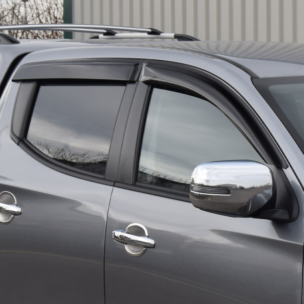 Mitsubishi L200 series 6 2019-2021 set of 4 stick-on tinted wind deflectors